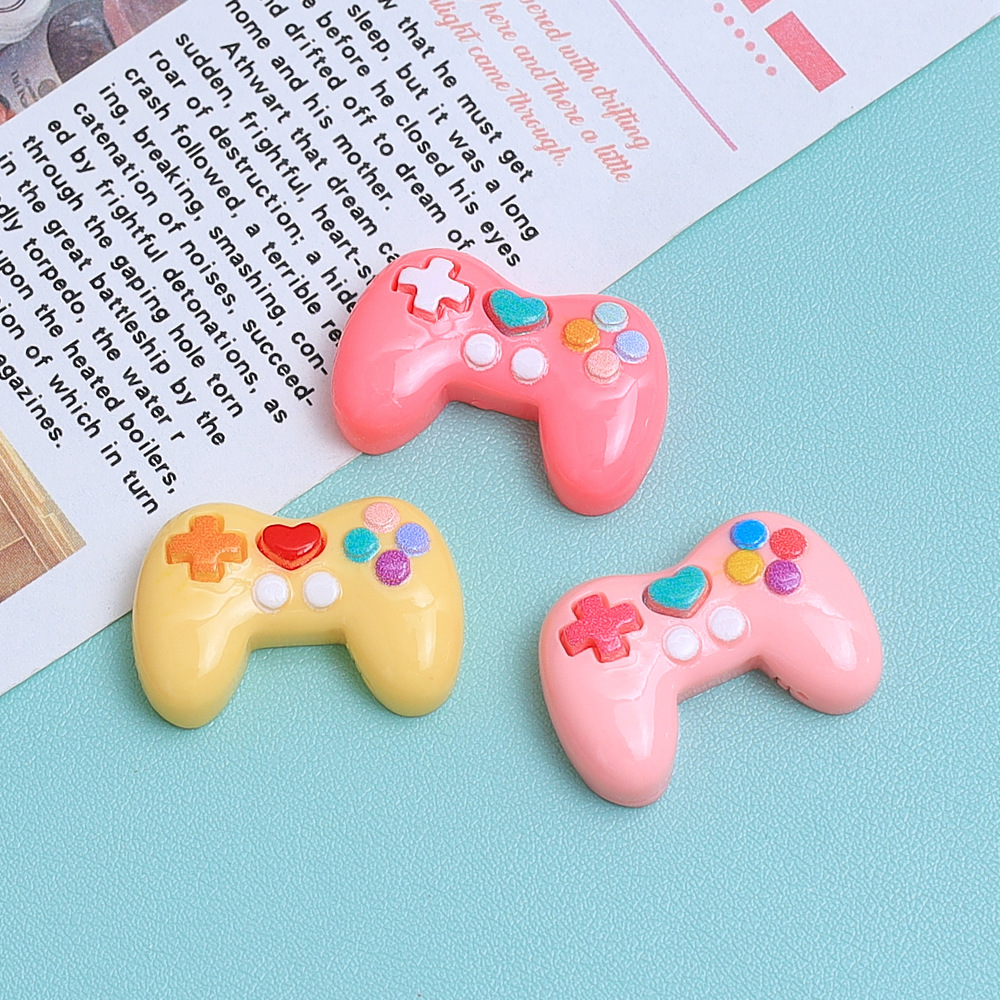 5 Breloques en résine colorées - Gaming Console And avis et prix